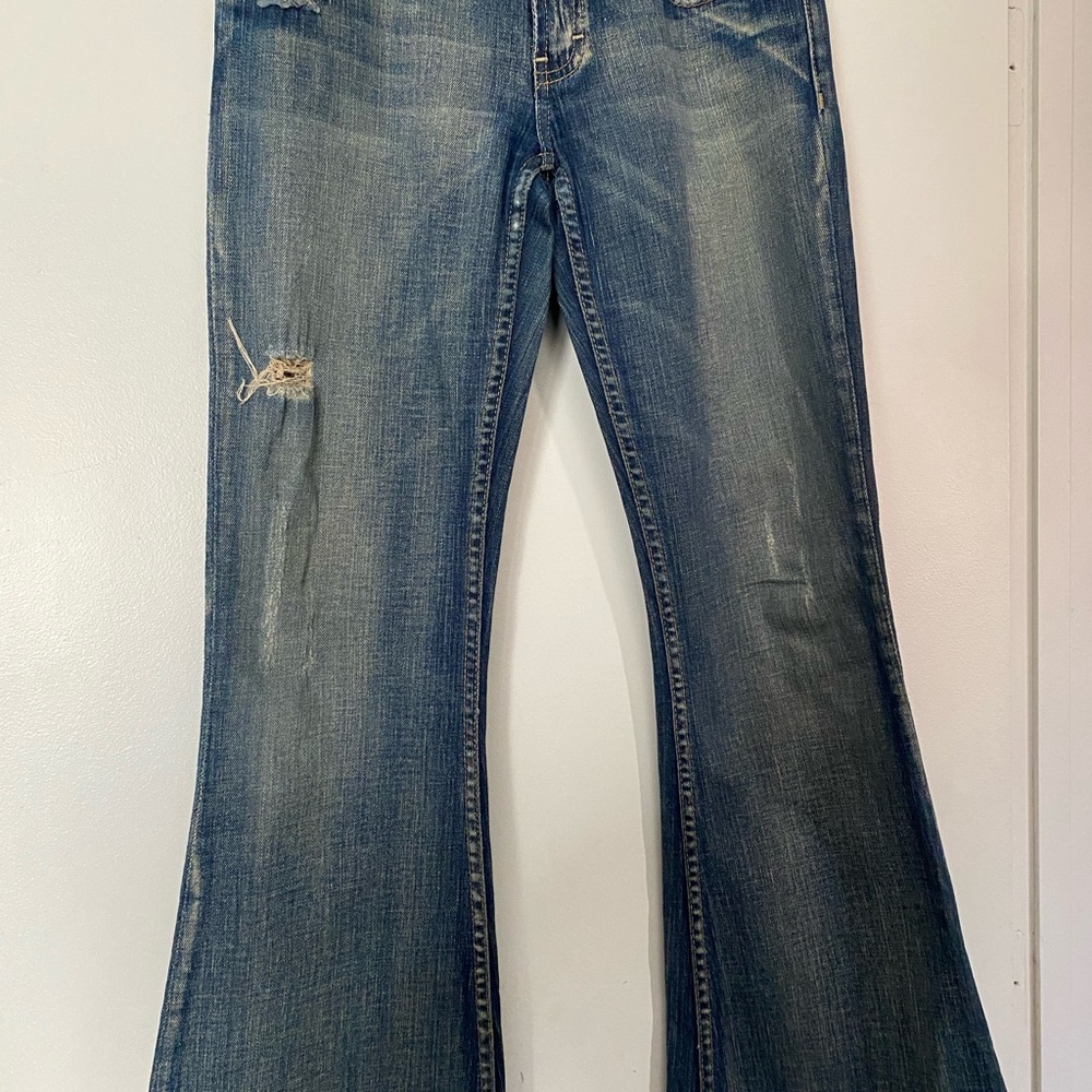 BKE Distressed flare leg star stretch jeans